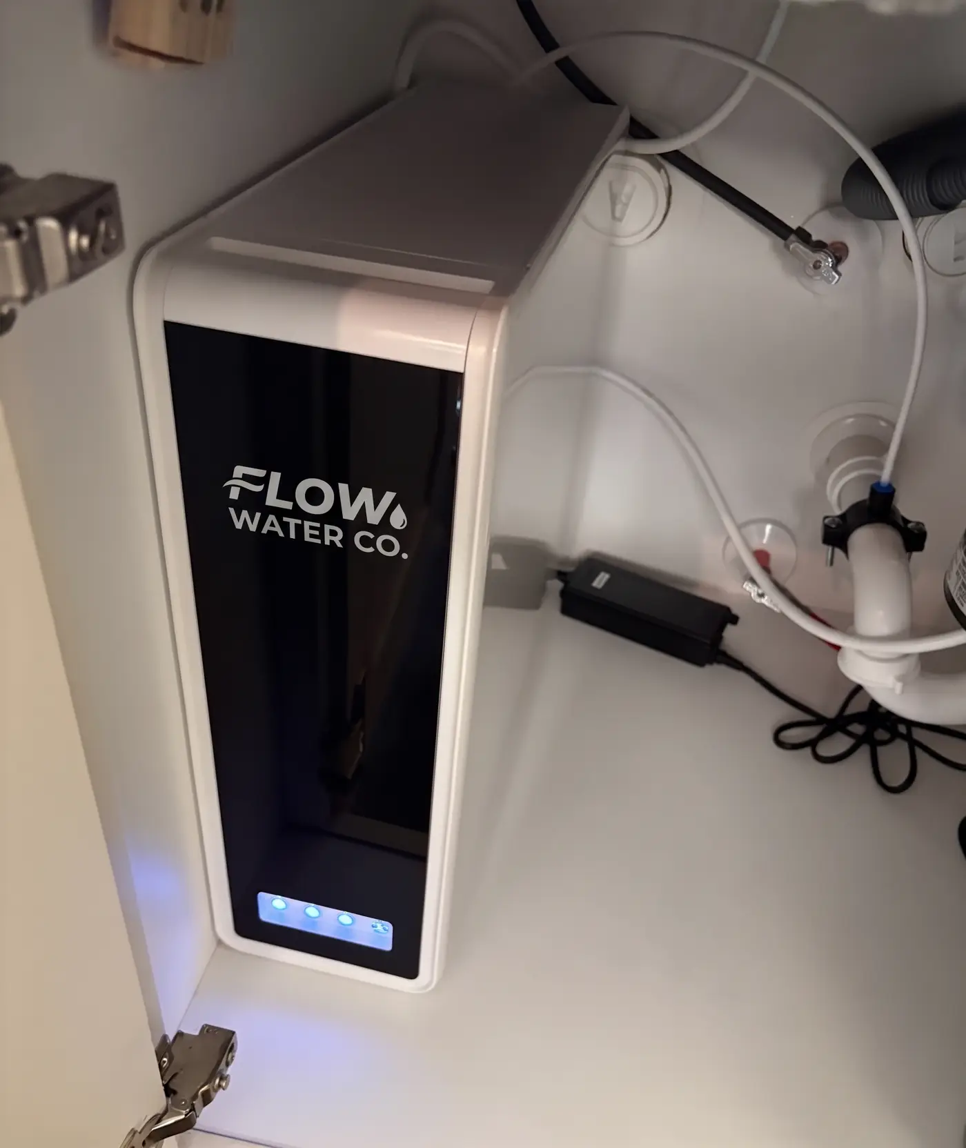 Tankless reverse osmosis system installed under a kitchen sink