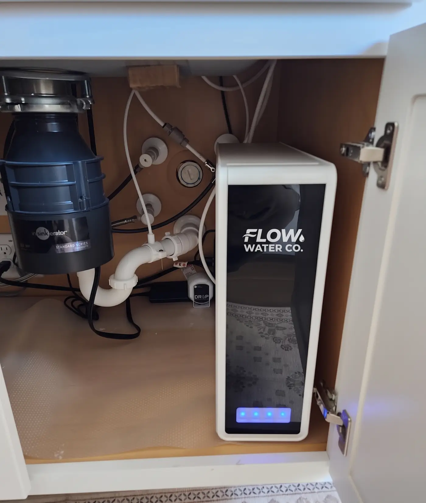 Reverse osmosis drinking water system with dedicated faucet line
